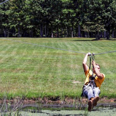 camper on zip line