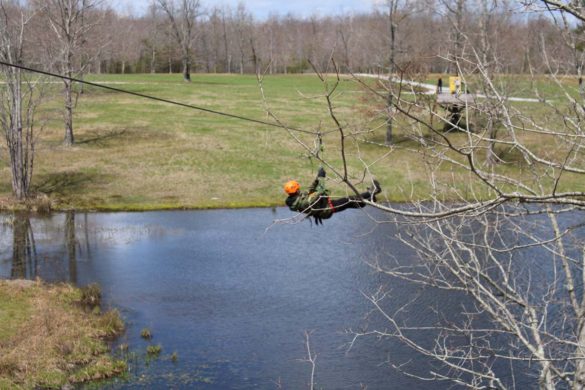 ziplining over lake during tennessee spring